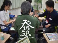お馴染みの「發」をモチーフにしたJMSAデザインのTシャツ　佐藤 恭子さん